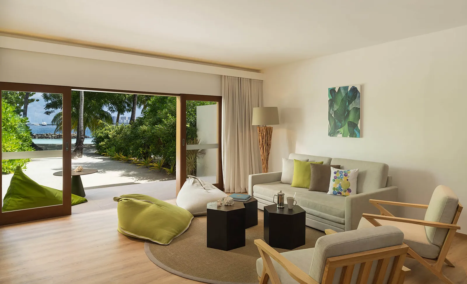 A Family Villa living room open to the garden