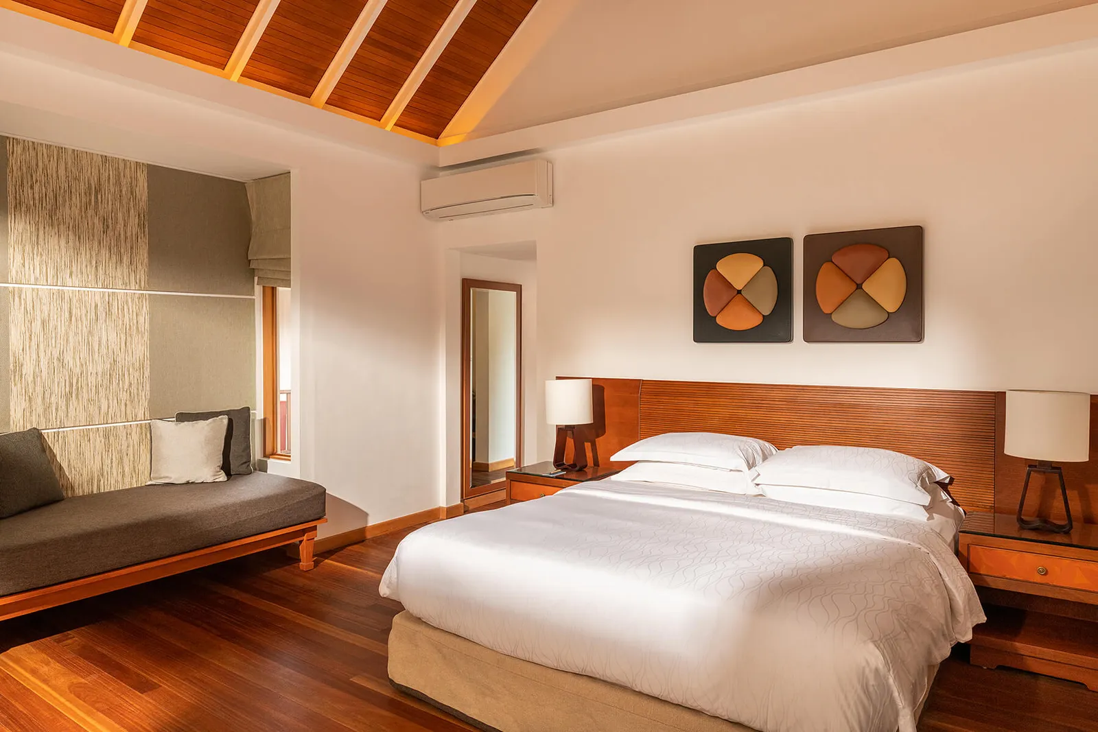 A Superior Room, the bed and the daybed beneath the pictures