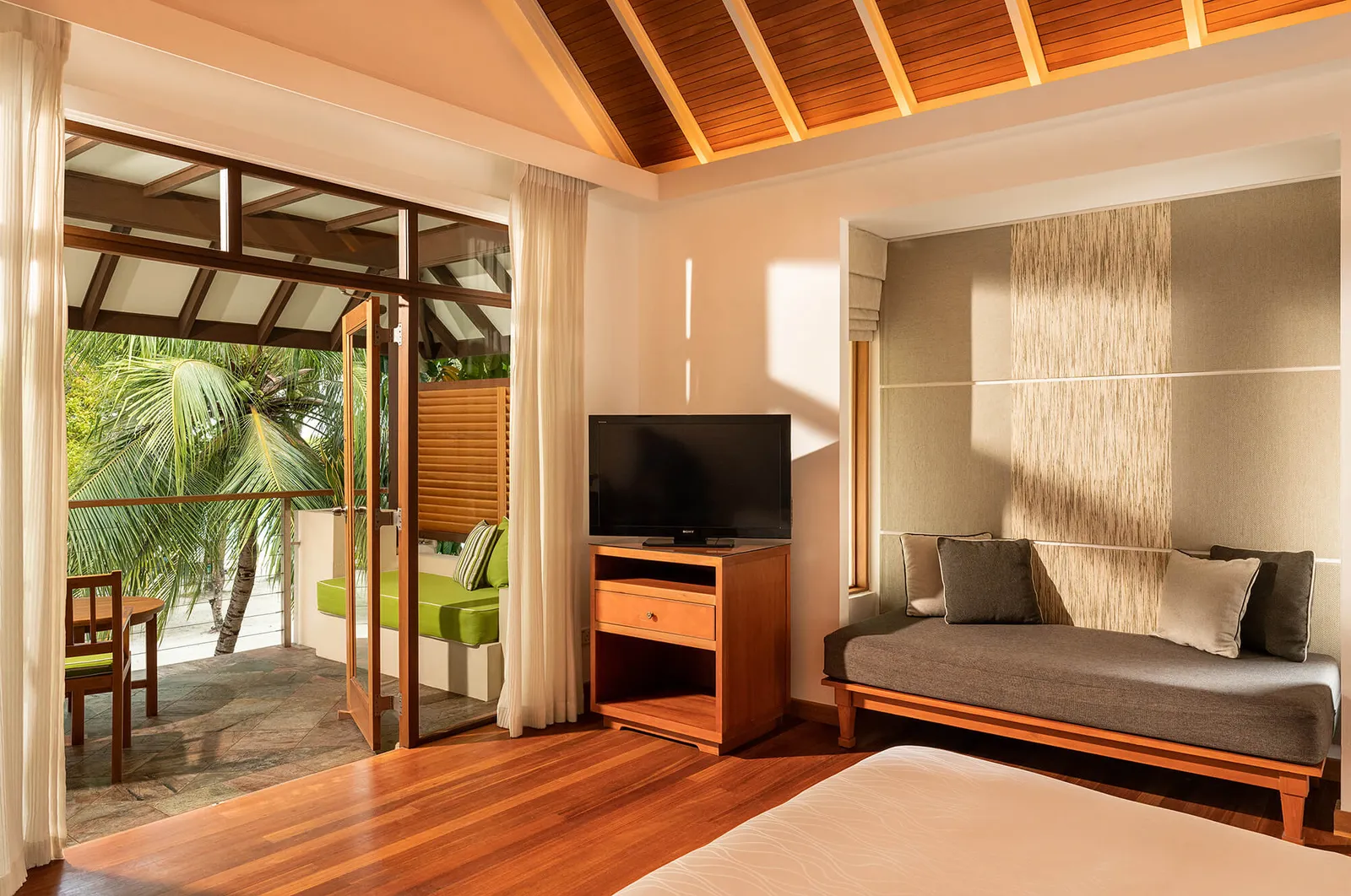 A Two Bedroom Superior Room bedroom, open to the terrace