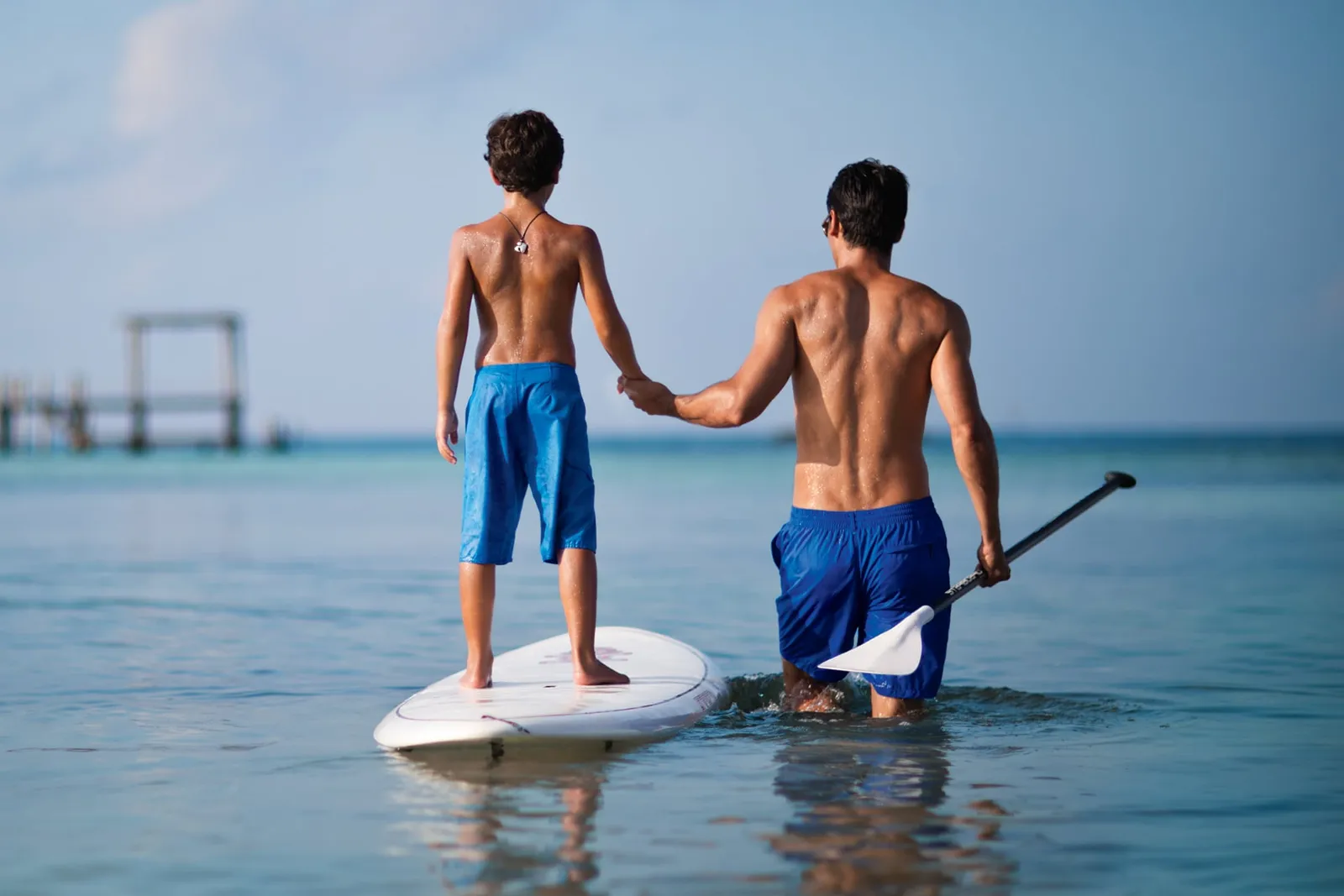 2 people on a paddleboard off NIZUC beach