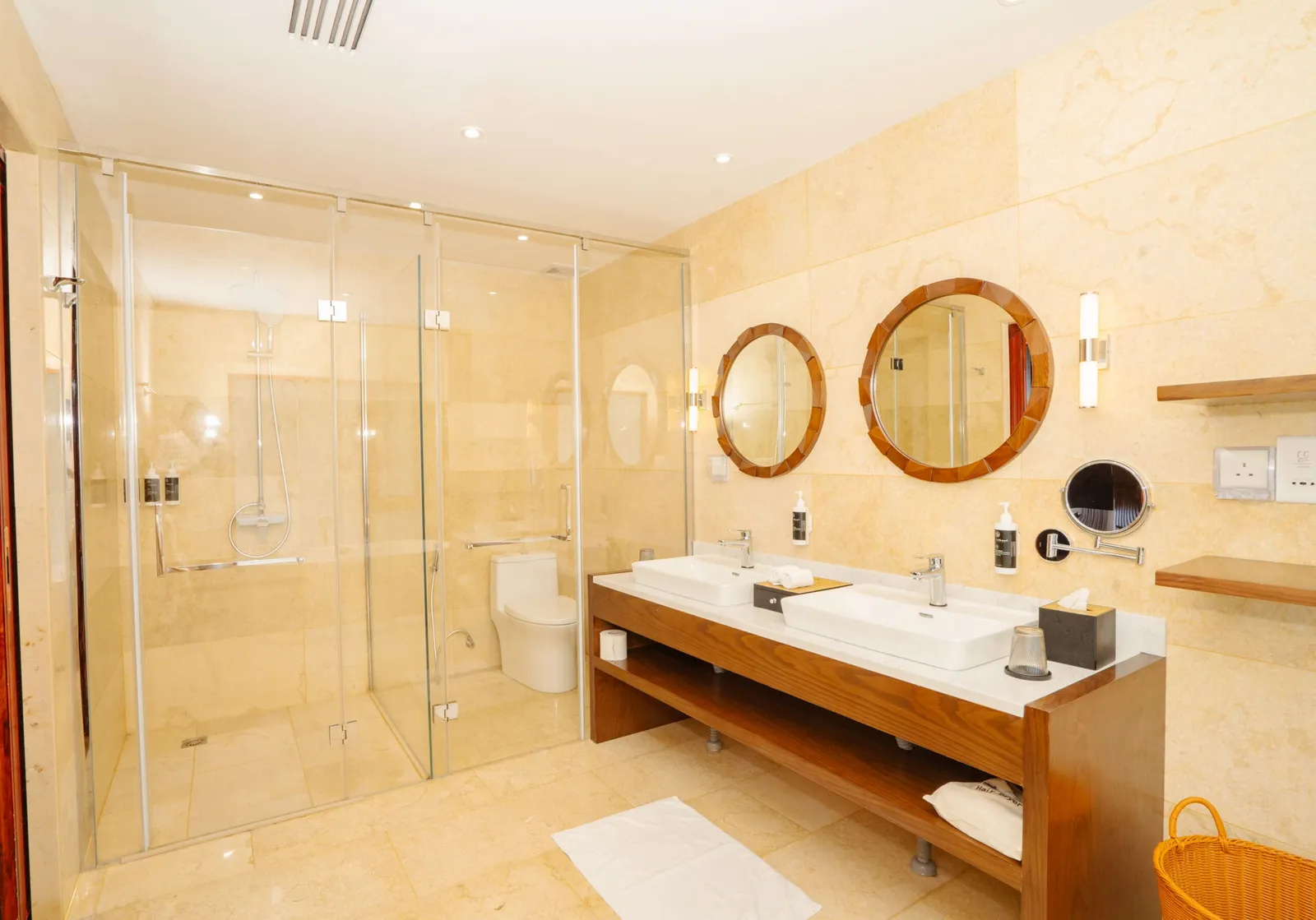 2 basins and glazed shower in the Duplex Overwater Villa bathroom