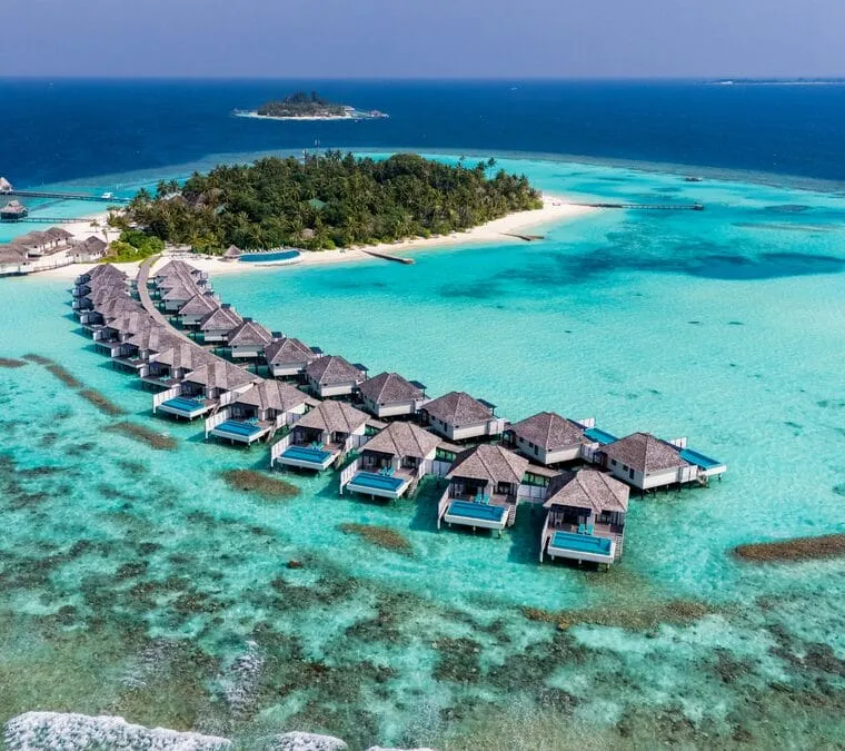 The island and water villas seen from above.
