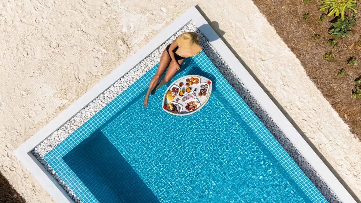 The private pool seen from above, with a floating tray.