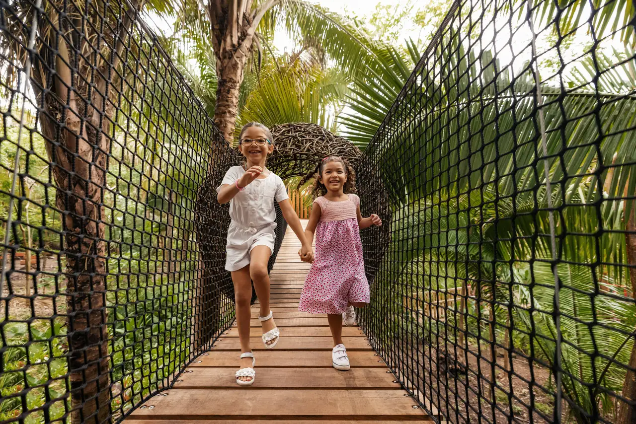 2 children on the wooden hanging bridge at KidsOnly