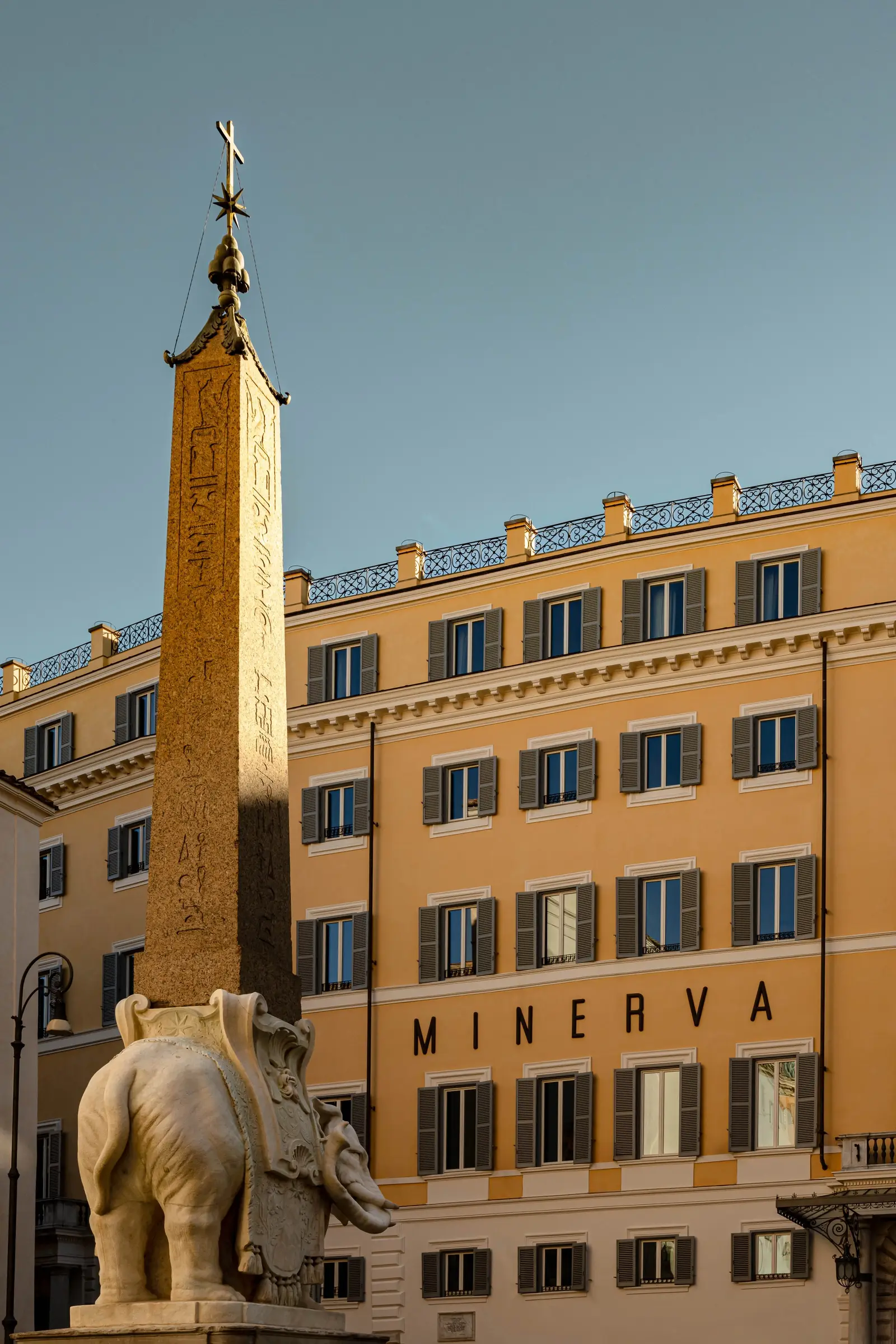 The facade on Piazza della Minerva with the MINERVA lettering and the elephant obelisk