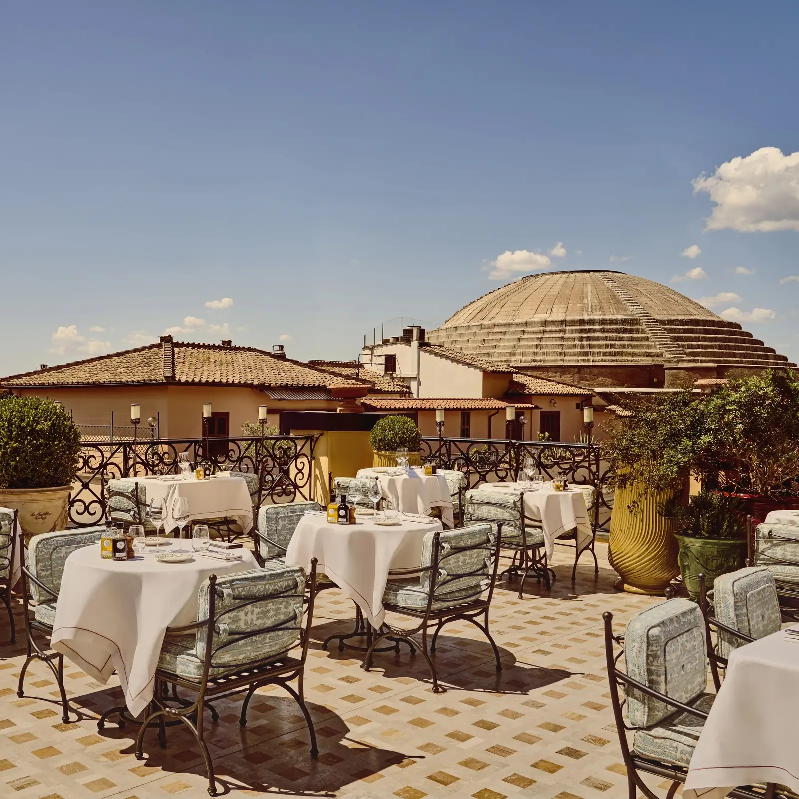 Gigi Rigolatto’s laid tables on the roof beside the Pantheon’s dome
