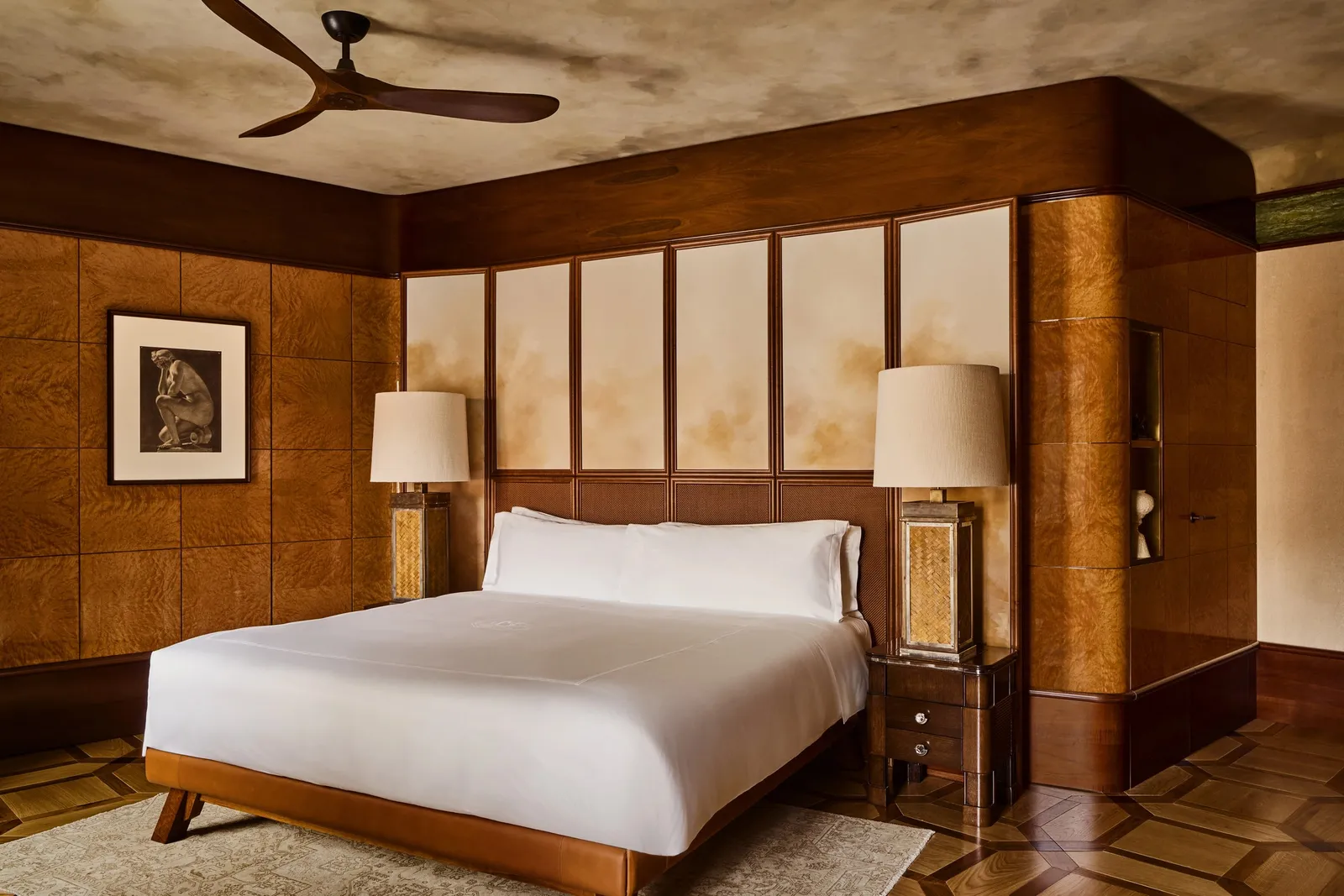 The Orient Express Suite’s master bedroom with the bed and lamps