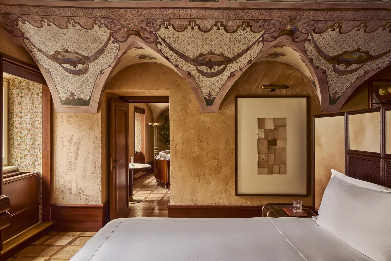 The Stendhal Suite with the bed beneath the frescoed vault