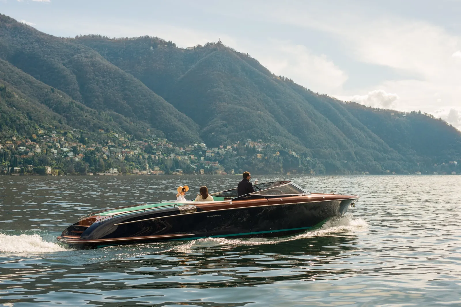 The hotel’s Riva Aquariva on the lake with the mountains behind