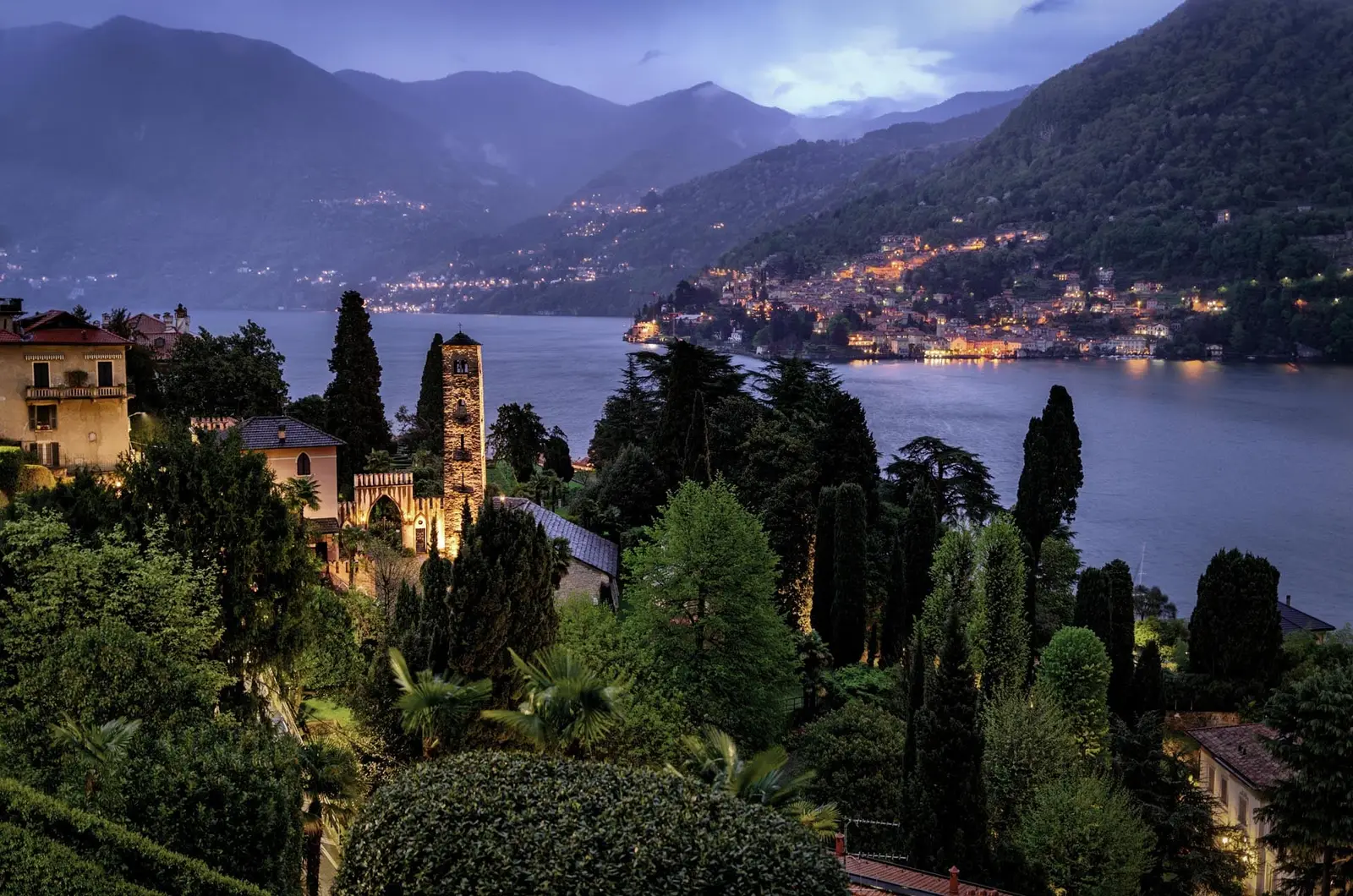 Moltrasio and the lake by night, the hills lit along the shore