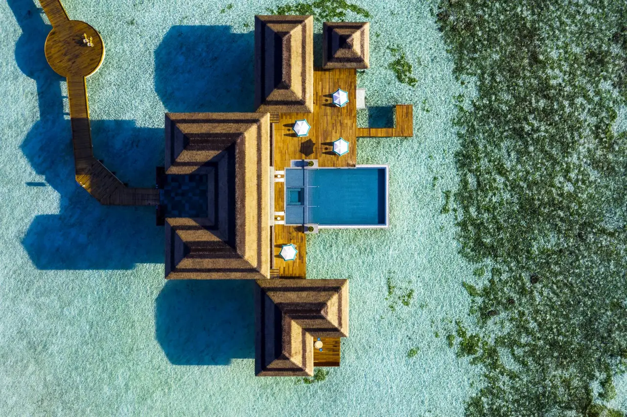 The Four Bedroom Ocean Pool Retreat from above, its infinity pool at the centre of the pavilions.