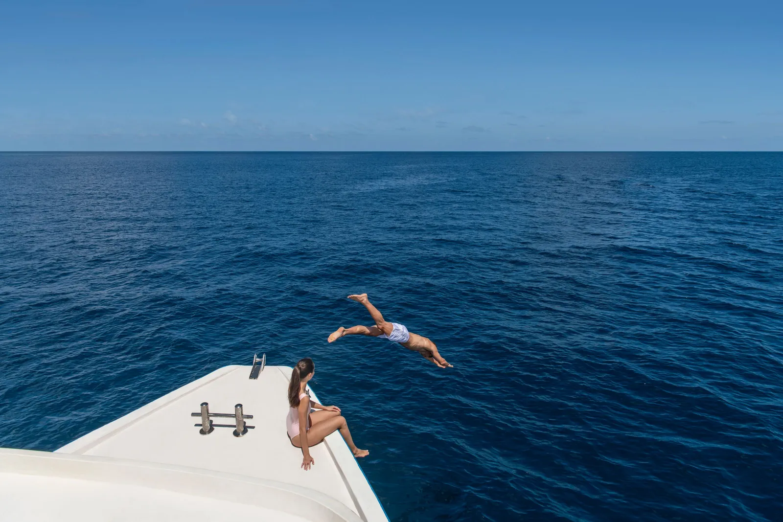 A dive from the boat into open sea on the trip to the equator