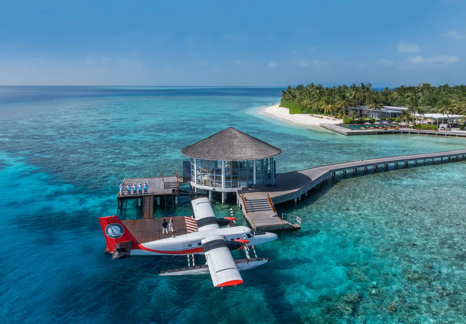 The seaplane moored at the arrival platform, Meradhoo behind