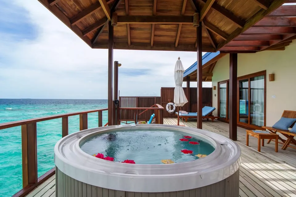 2 Bedroom Water Villa Suites With Spa Tub in an official photograph
