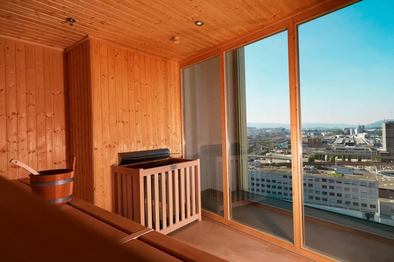 Sauna with a window overlooking Zurich