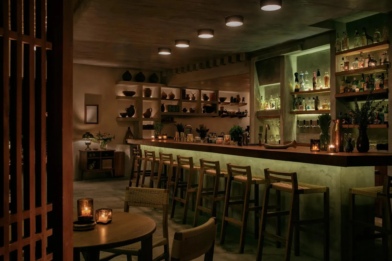 Zapote Bar’s dark-wood counter, its bottles on show