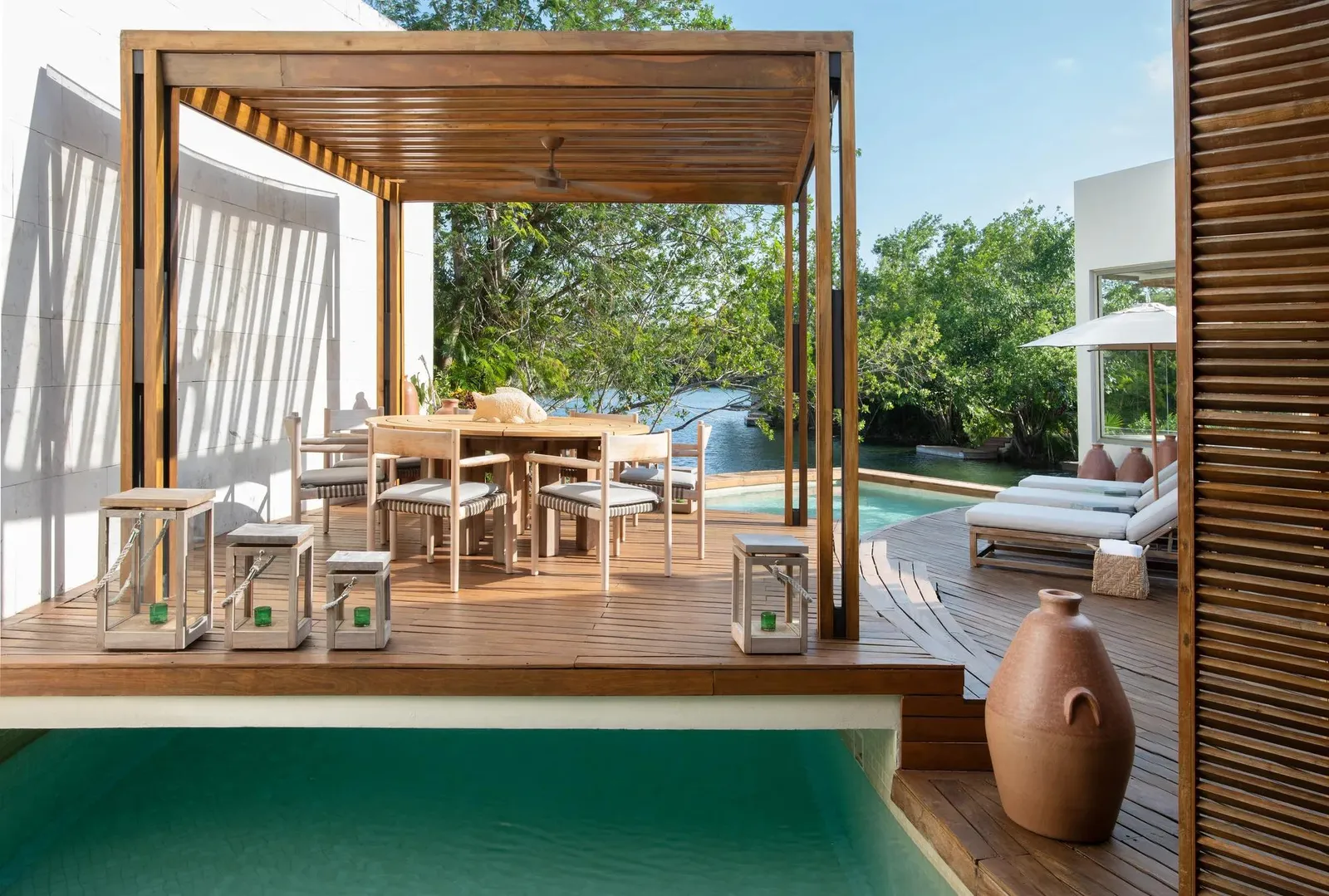 The pool deck and the open-air dining room