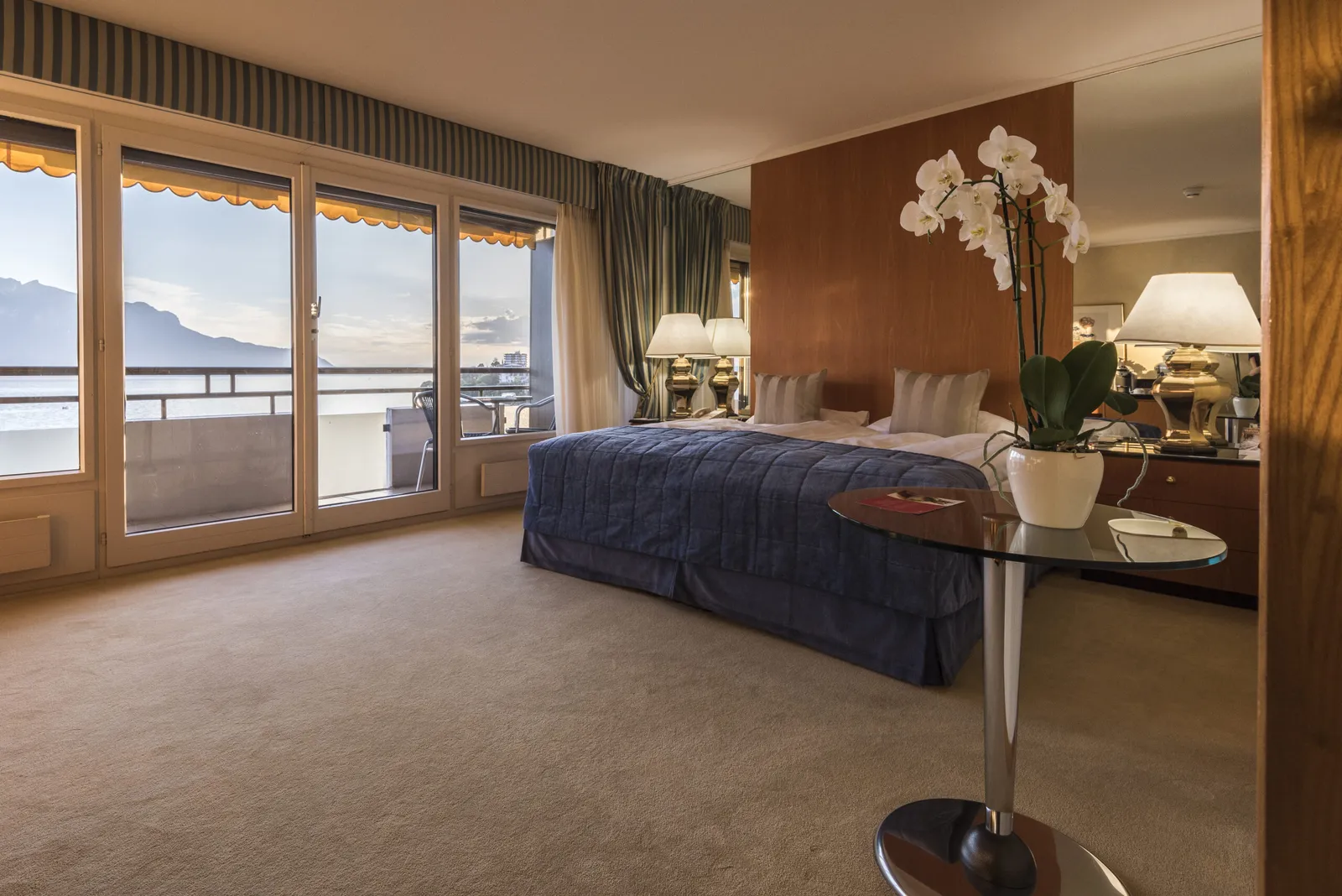 The Deluxe Room bedroom and balcony