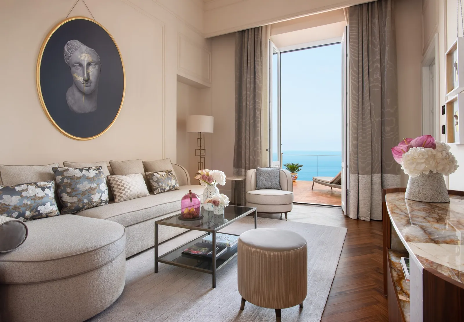 San Domenico Suite living room with a doorway open towards the sea