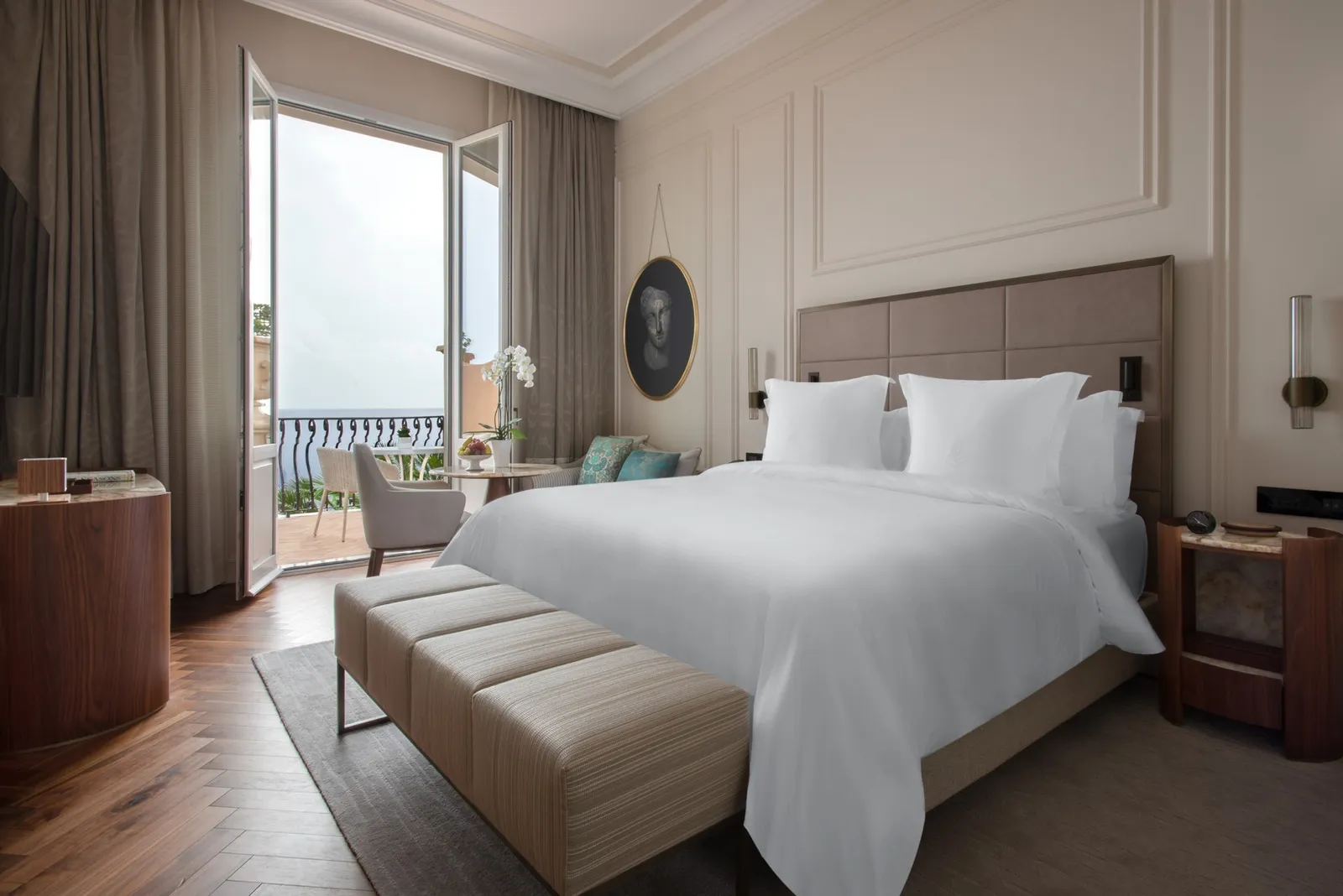 Bed and terrace doorway in a Sea-View Premium Room with Terrace
