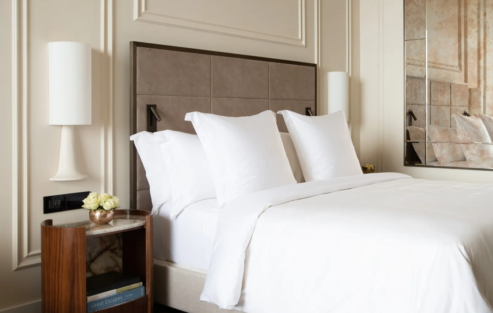 Bed and bedside table in a Superior Room