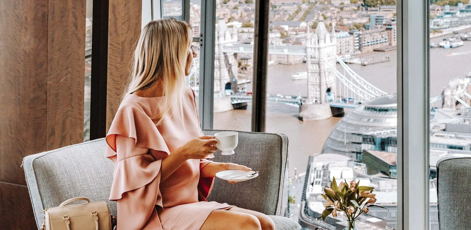 A cup of tea at the window, with Tower Bridge and the Thames below