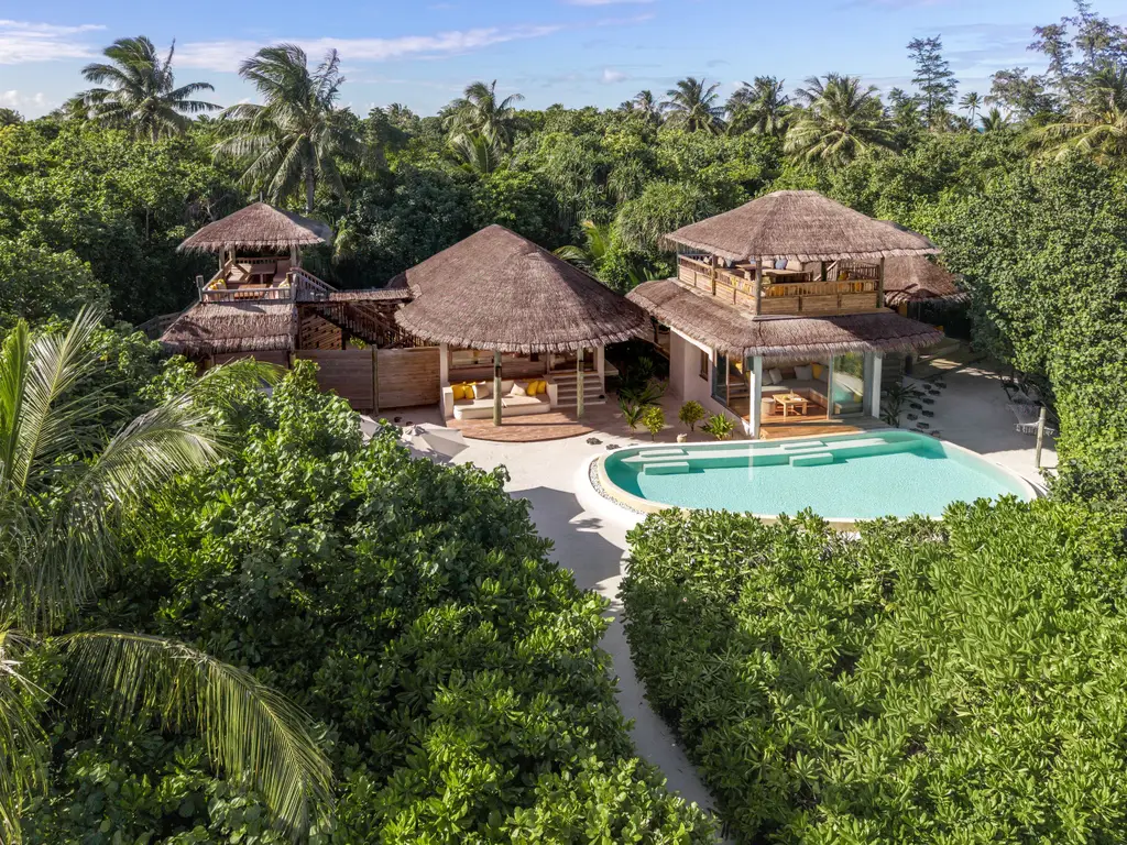 The Two-Bedroom Lagoon Beach Villa with Pool, its 2 pavilions and the pool