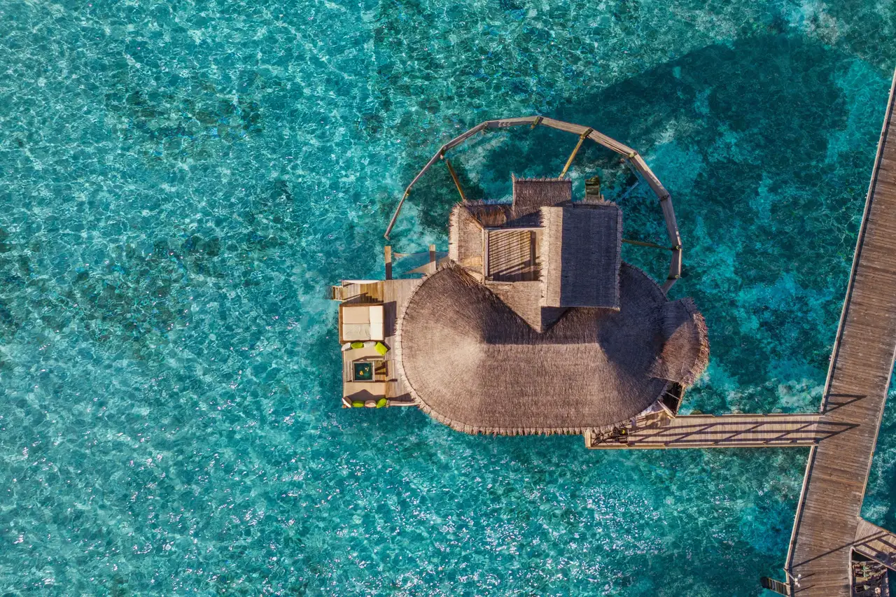 A Lagoon Water Villa from above, over the shallow lagoon