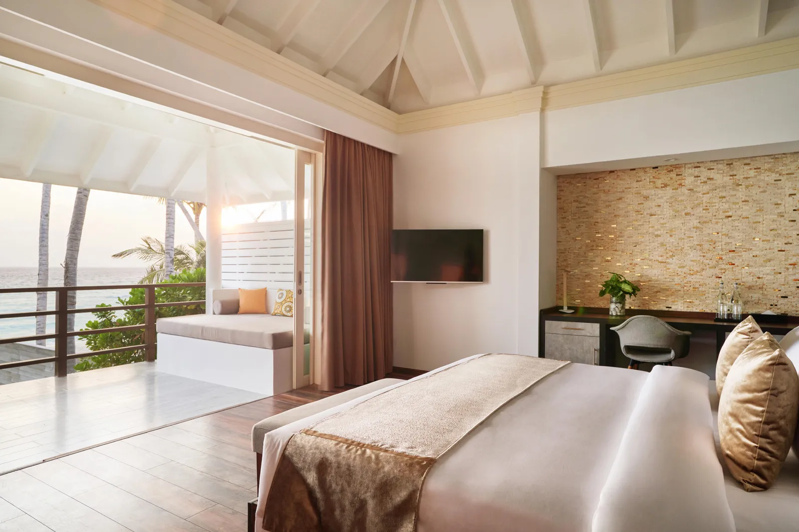 A Two Storey Pool Beach Residence bedroom, the bed facing the windows