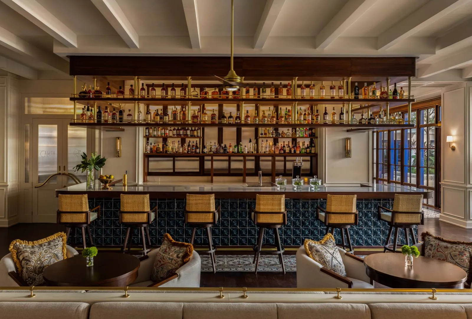 The counter and bottles in Mayda Lobby Bar