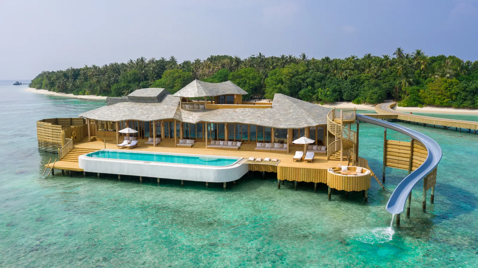 A Water Reserve from the air, its deck pool and the slide into the lagoon