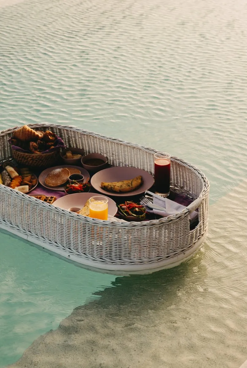 Breakfast on a floating tray in a villa pool