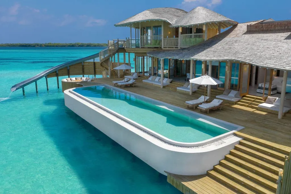 The 2 Bedroom Water Reserve: the long pool on the deck and the steps to the sea