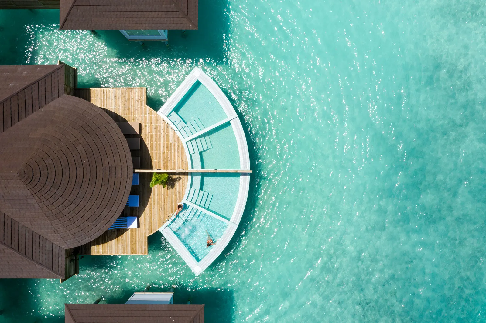 Ocean Spa from above, its fan-shaped deck and pool on the lagoon