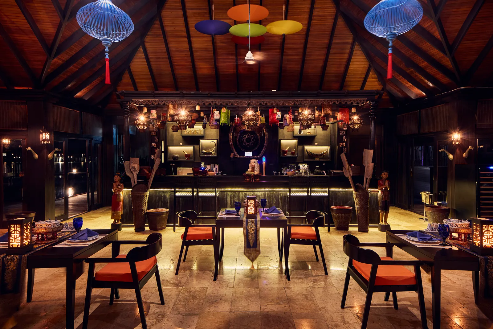 Siyam Orchid’s dining room, the counter and hanging lanterns