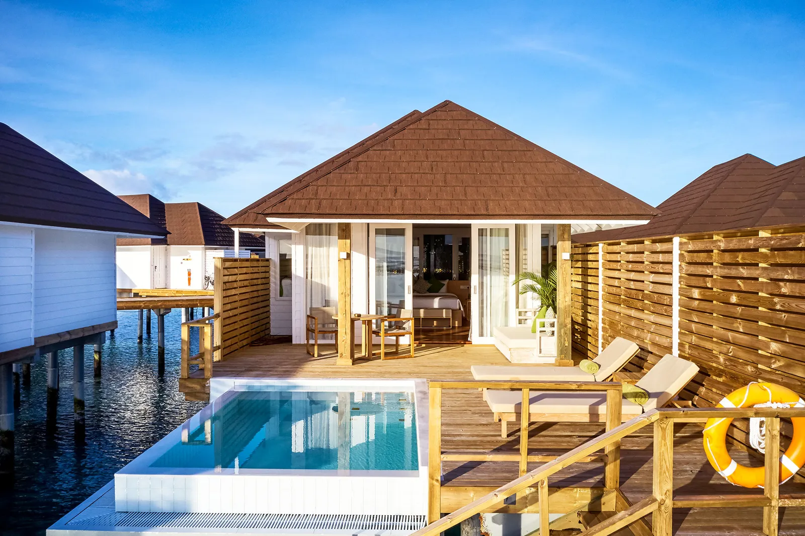 A Grand Water Villa with Pool, the deck pool and the villa behind