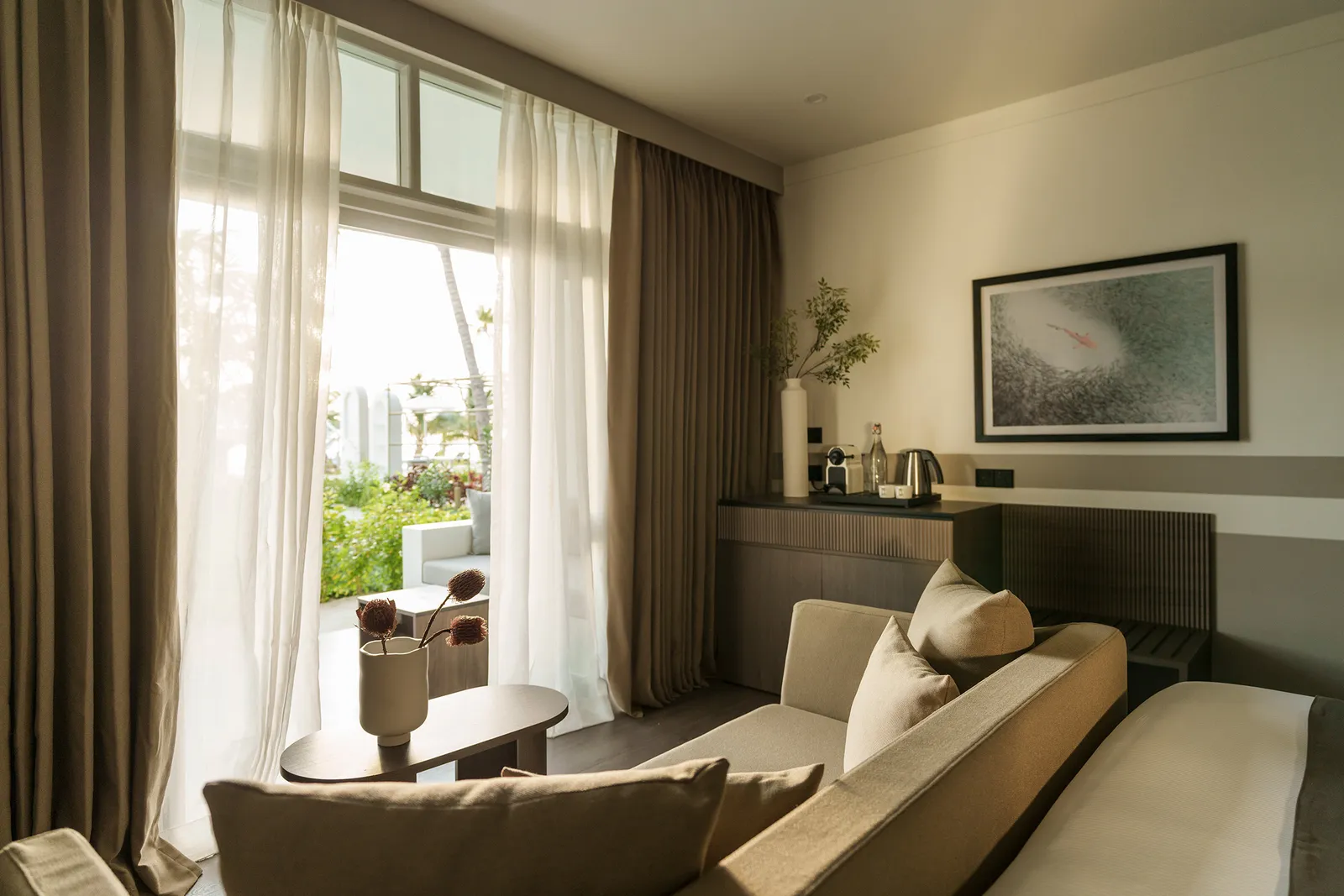 A Sunset Beach Pavilion sitting area, the sofa facing the windows