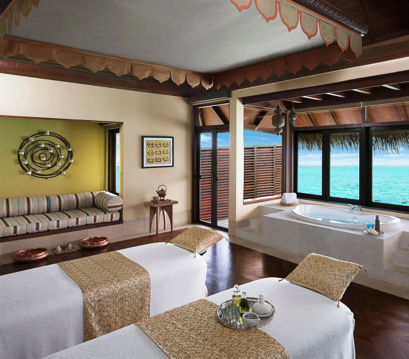 2 treatment beds and a bath in the sea-facing spa suite