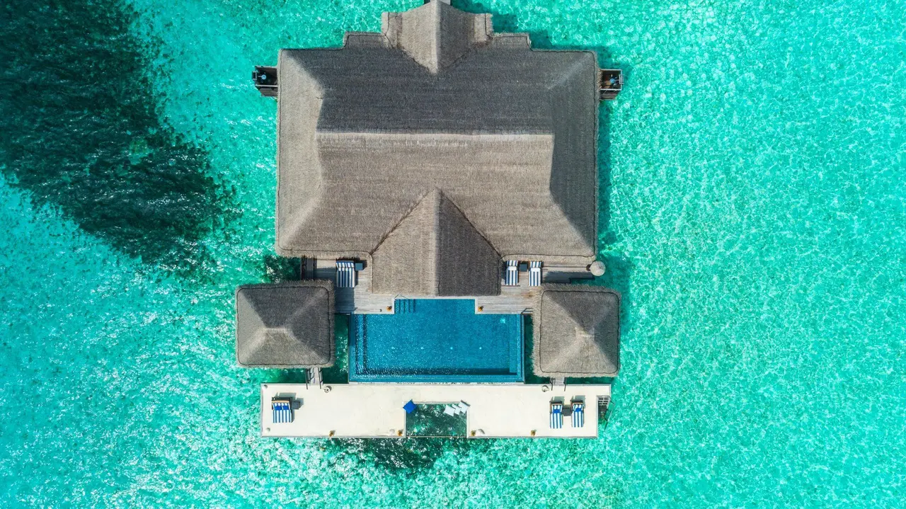 A villa’s private pool and deck, seen from above