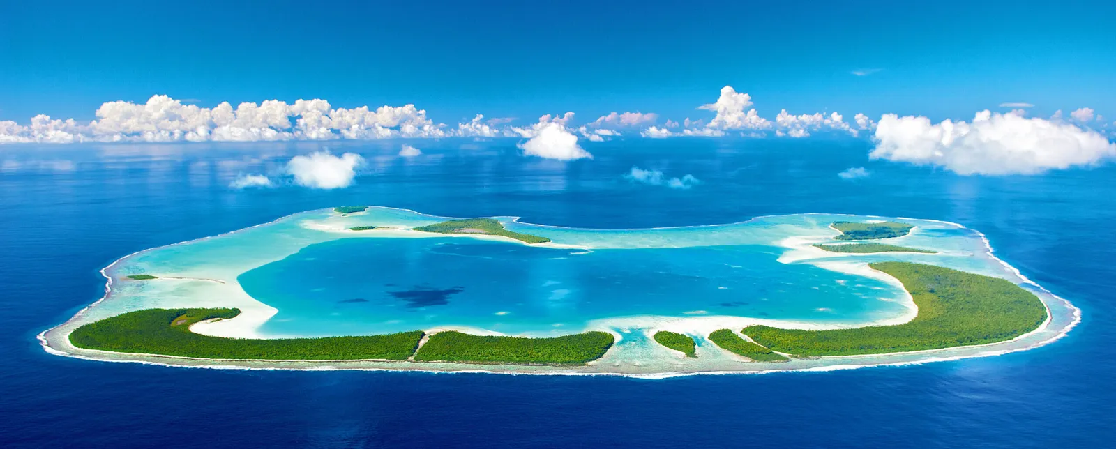 The Tetiaroa atoll from the air: the ring of motus around the lagoon