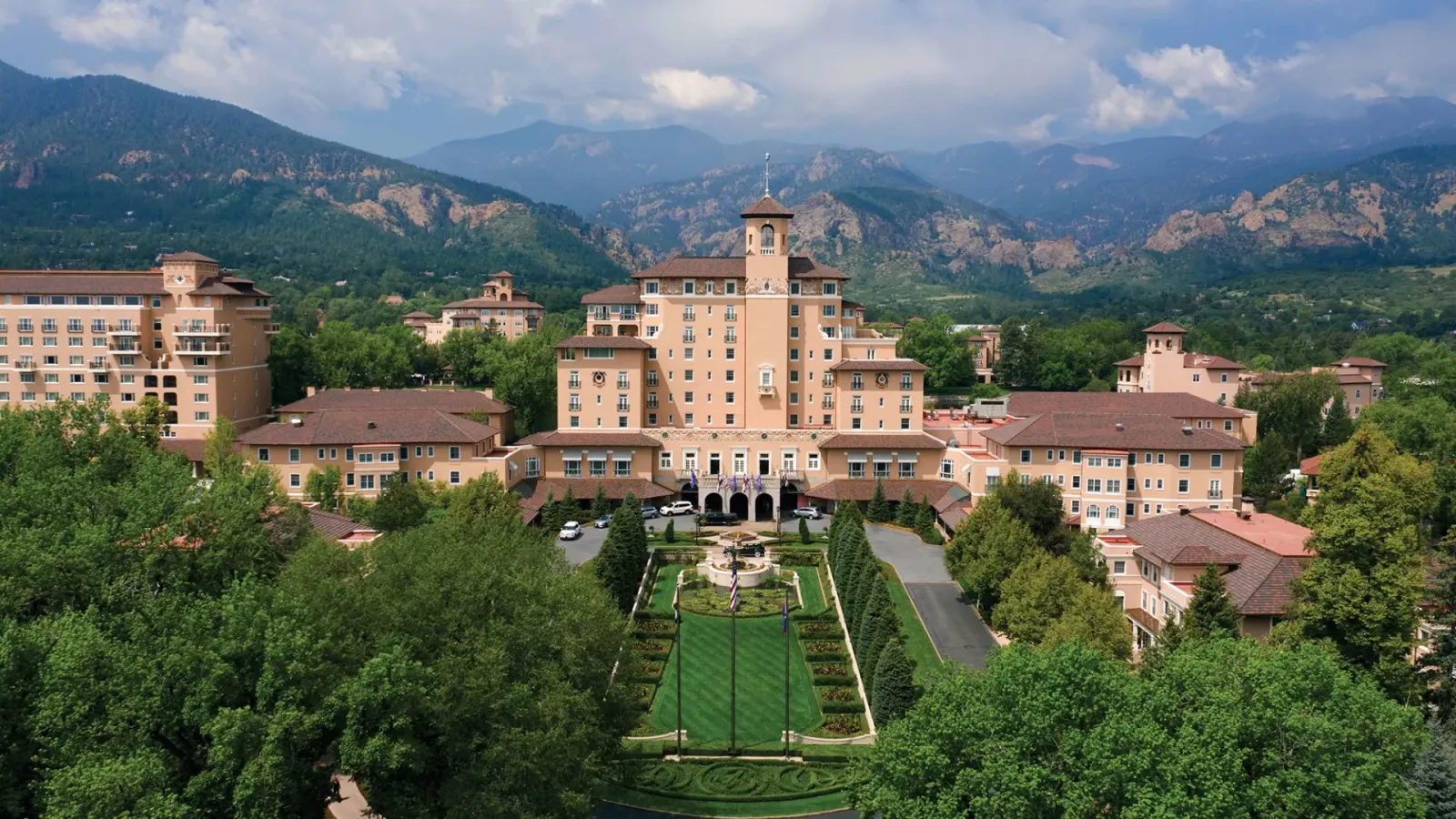 The Broadmoor with the Rocky Mountains behind