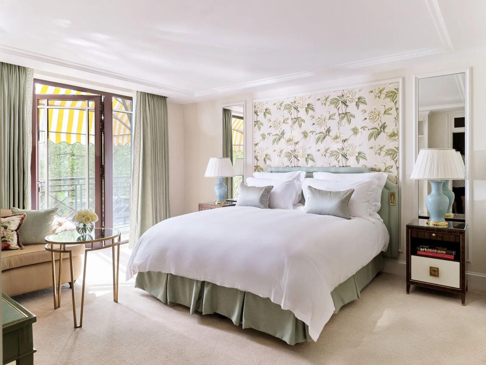 Deluxe Park View Room: the French window under the yellow-striped awning