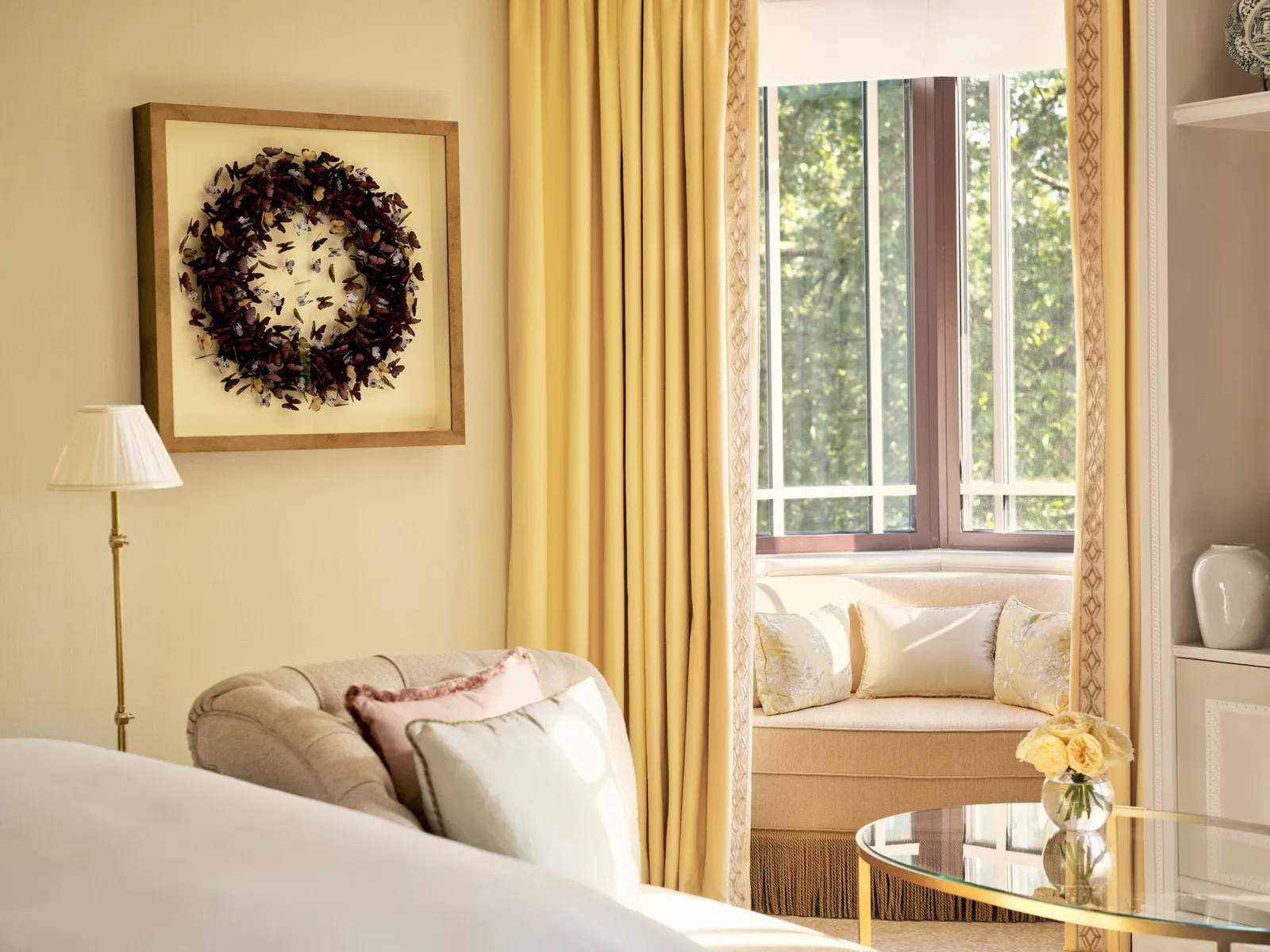 Dorchester Suite: the bed and the curved window seat