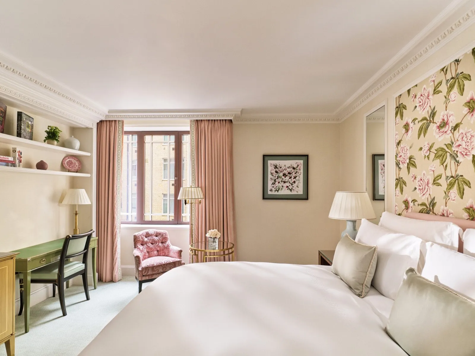 Superior Room: the king bed and the botanical wallpaper