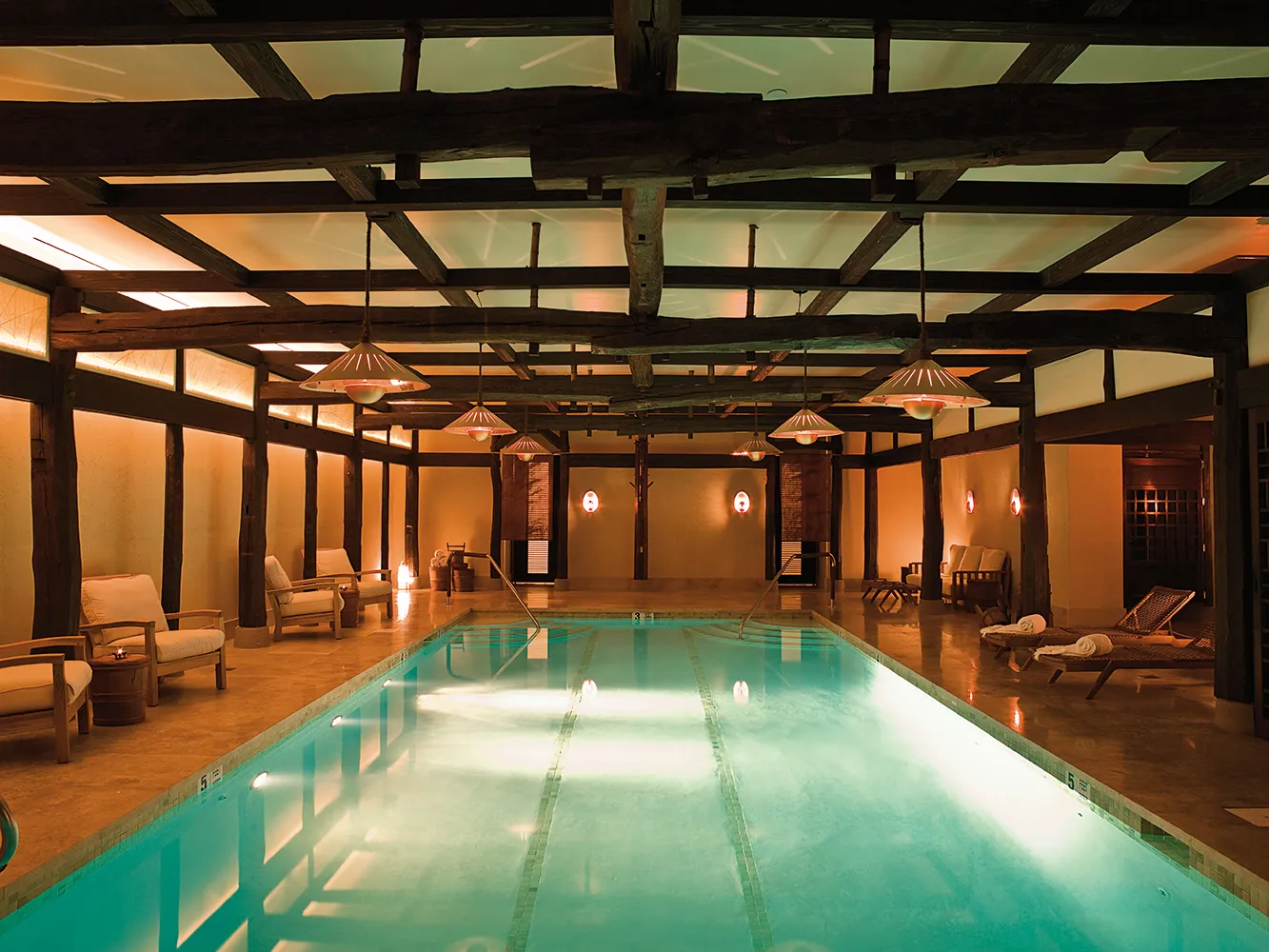 Shibui’s pool under the timber beams and the lanterns