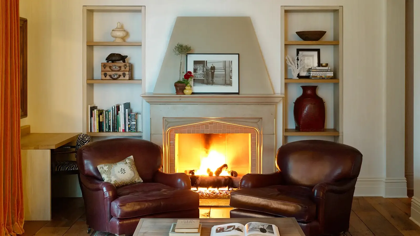 The Fireplace Corner Suite’s fireplace between the armchairs