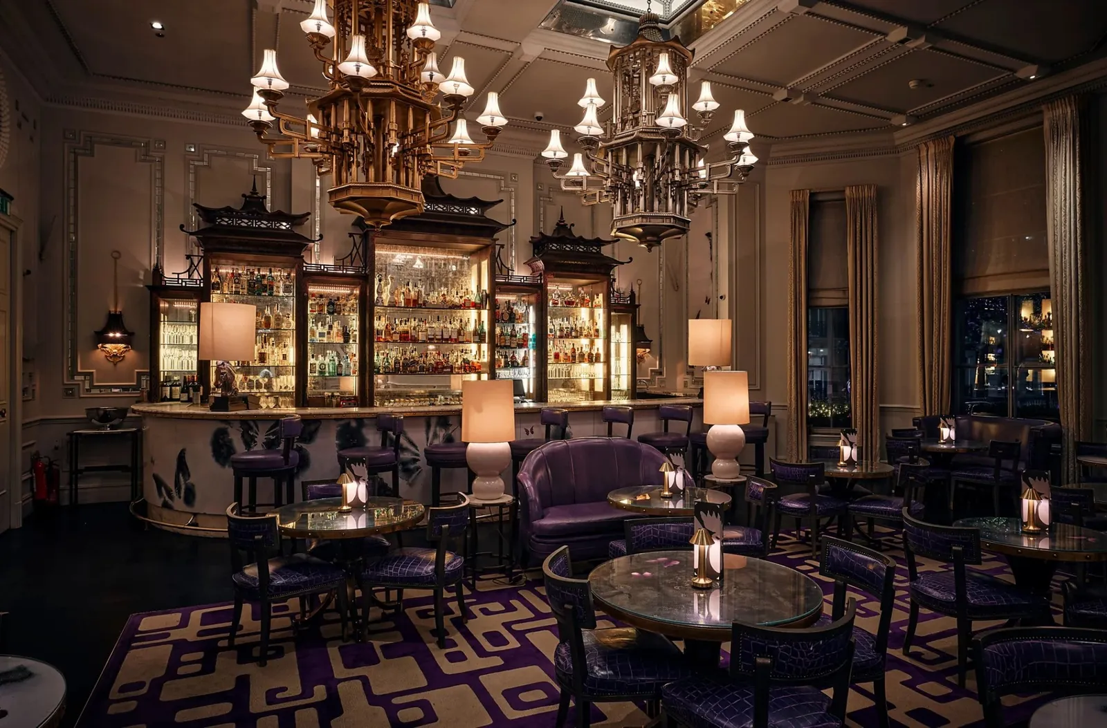 Artesian: gilded pagoda chandeliers, a backlit bar and purple armchairs
