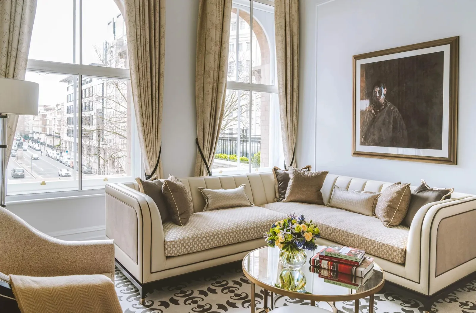 The Portland Suite’s sitting room: a corner sofa, high ceilings and windows onto Portland Place