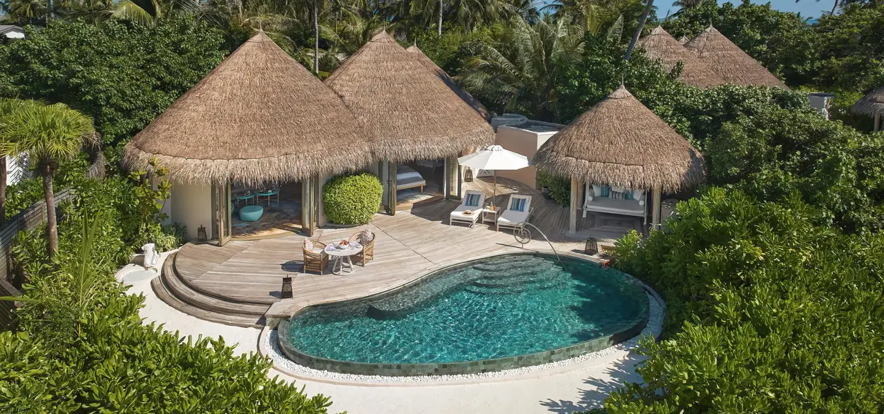The beach house with its pool and terrace.