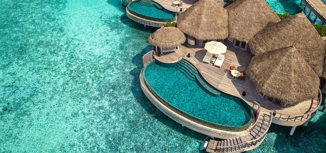 The overwater pool and terrace seen from above.